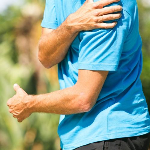 A man seeking treatment for shoulder pain from a No-Fault or Workers Compensation doctor. A man seeking treatment for shoulder pain from a No-Fault or Workers Compensation doctor.