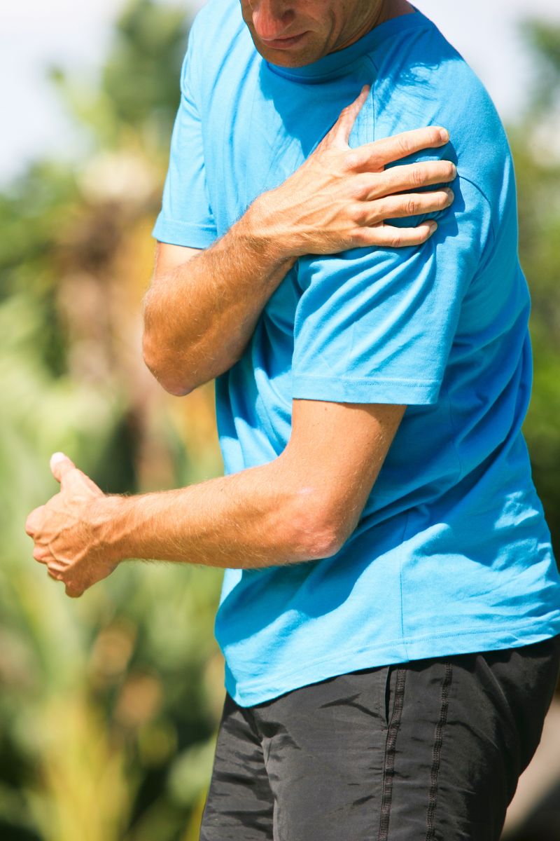 A man seeking treatment for shoulder pain from a No-Fault or Workers Compensation doctor.