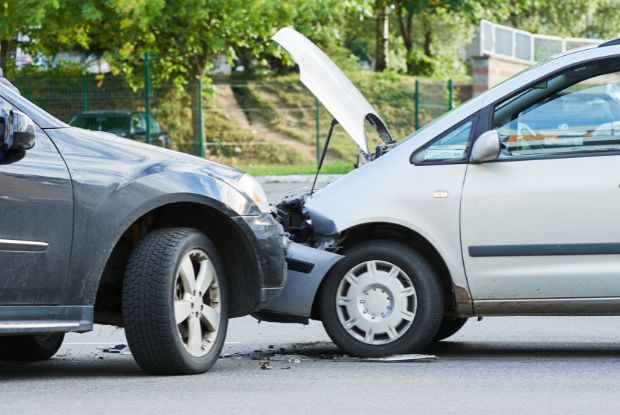 A car involved in a car accident, requiring assessment by no-fault doctors for potential workers compensation claims.