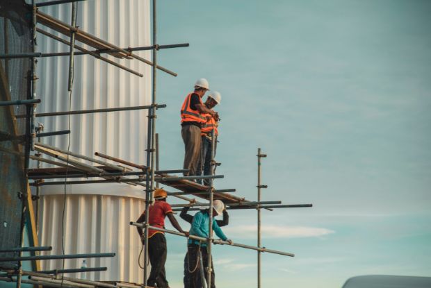 Construction workers working on a wind turbine seeking services from no-fault and workers compensation doctors.