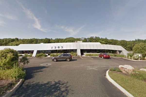 A google street view of a Ford dealership specializing in Workers Compensation and Orthopedic services.