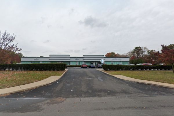 A Google Street View of a Farmingville NY office building.